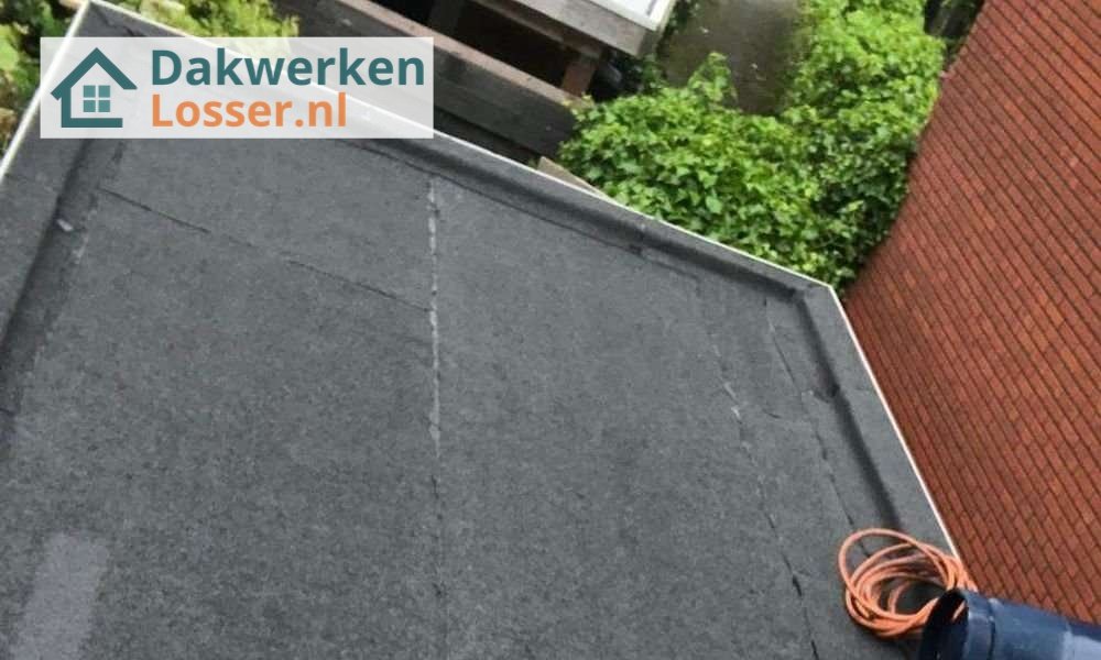 Wat kost een plat dak herstellen in Losser?